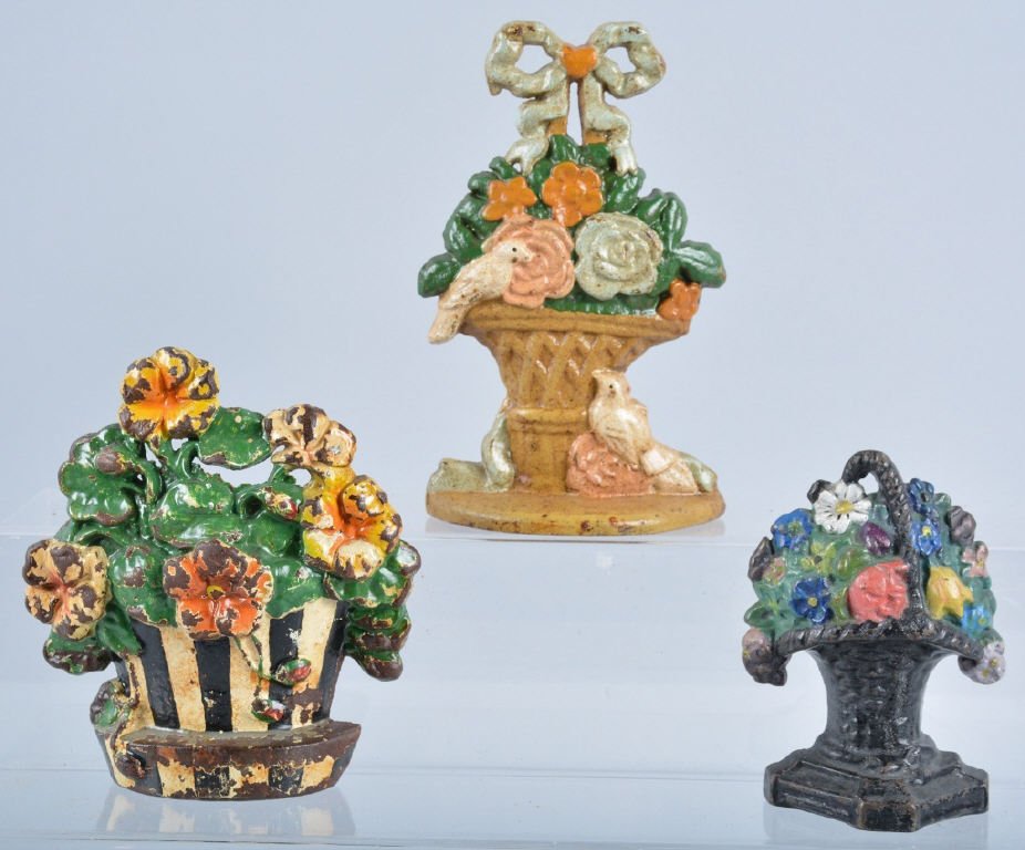 Lot of 3 Vintage Cast Iron Door Stops: 3 Basket of Flowers doorstops, largest is 9", Overall paint loss, display very well, Good-Very Good