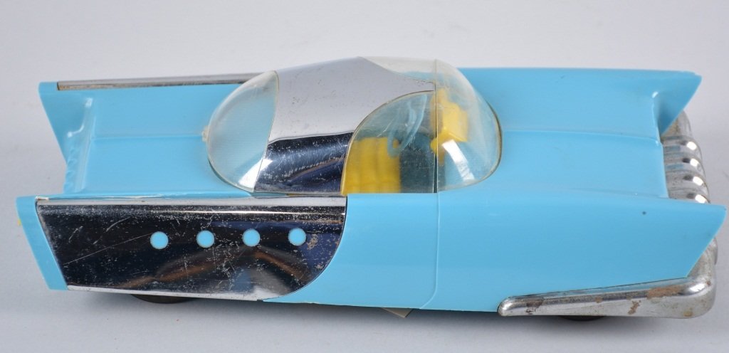 MATTEL Friction FUTURISTIC DREAM CAR: Very cool looking plastic Dream car made by Mattel. All original measures 10". Very Futuristic desing. Friction drive works good. Tiny chip in front fender. Very Good