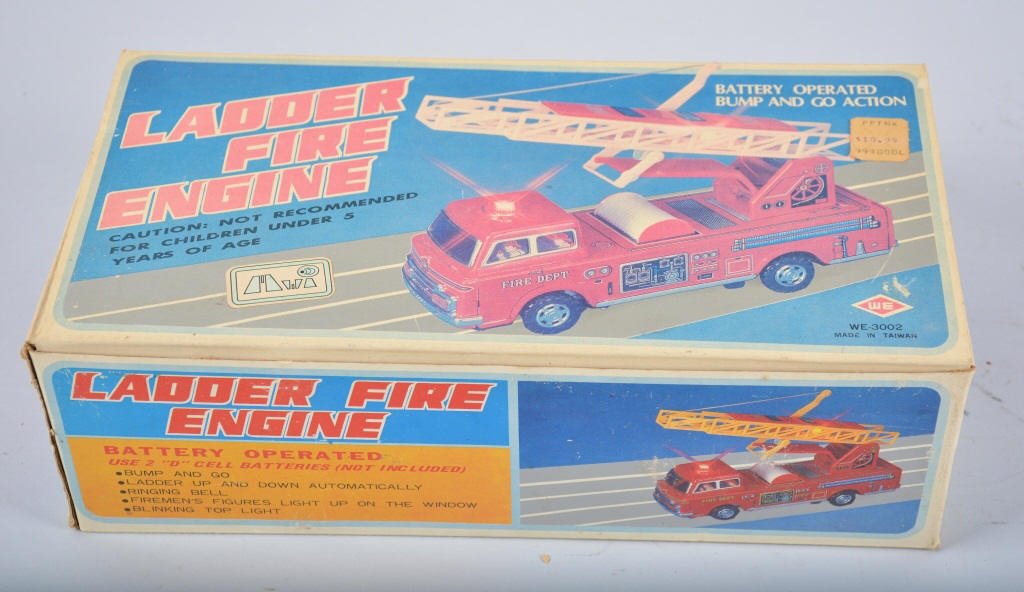 WE Battery Op LADDER FIRE ENGINE w/Box: Nice tin and plastic Battery Op Ladder Fire Engine. All original measures 11" Long. Look never played with in Box. Works. Near Mint