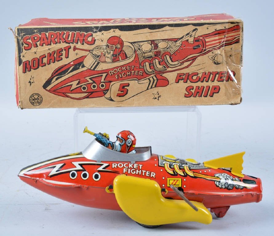 MARX Tin Windup SPARKLING ROCKET FIGHTER w/BOX: Classic Marx Toy. All original including tailfin and works. Excellent colors and graphics. Looks never played with condition. With original box. Near Mint