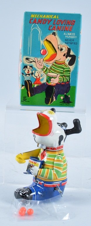 TPS Tin Windup CANDY LOVING CANINE w/BOX: Excellent looking TPS toy made in Japan. All original and works great. Excellent colors and graphics. Looks to be New Old Stock never played with. With colorful box with inserts. Near Mint