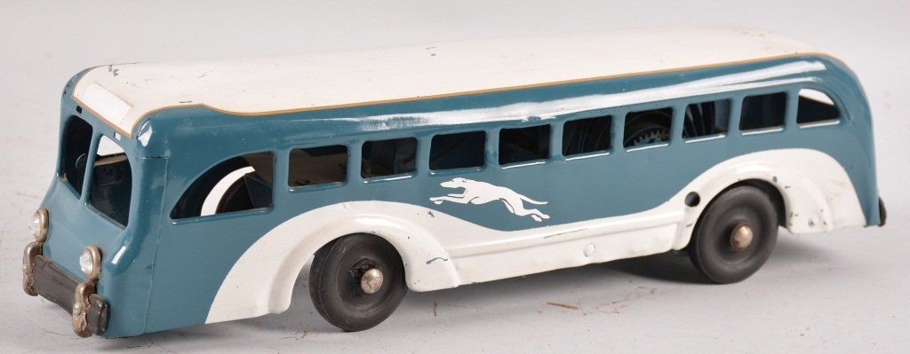 BUDDY L Pressed Steel Windup GREYHOUND BUS: Nice looking Buddy L Greyhound Bus. Nicely restored original. Windup mech works. Measures 16" long. Very Good