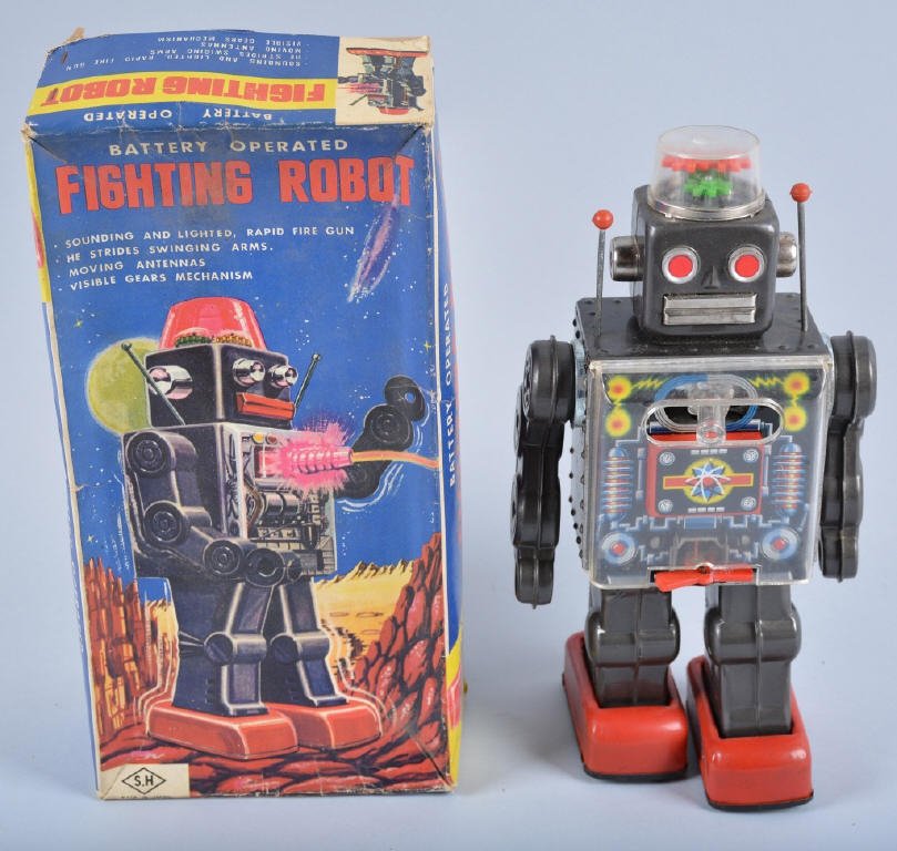 SH JAPAN Battery Op FIGHTING ROBOT w/BOX: Excellent Robot made in Japan. All original with scarce original box. Great looking robot. Battery door has some corrosion. Nice colorful box. Toy is not working. Very Good