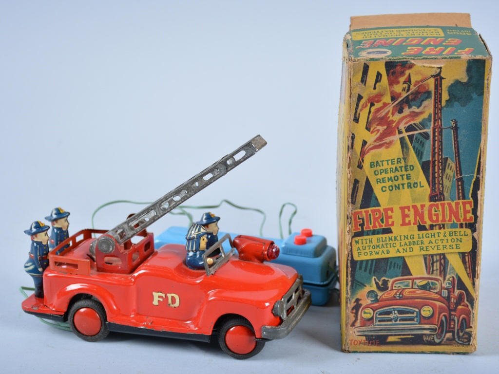 JAPAN Battery Op FIRE ENGINE w/BOX: Great looking Battery Op Fire Truck. Great colors and details. Not working. Come with colorful original box. Excellent