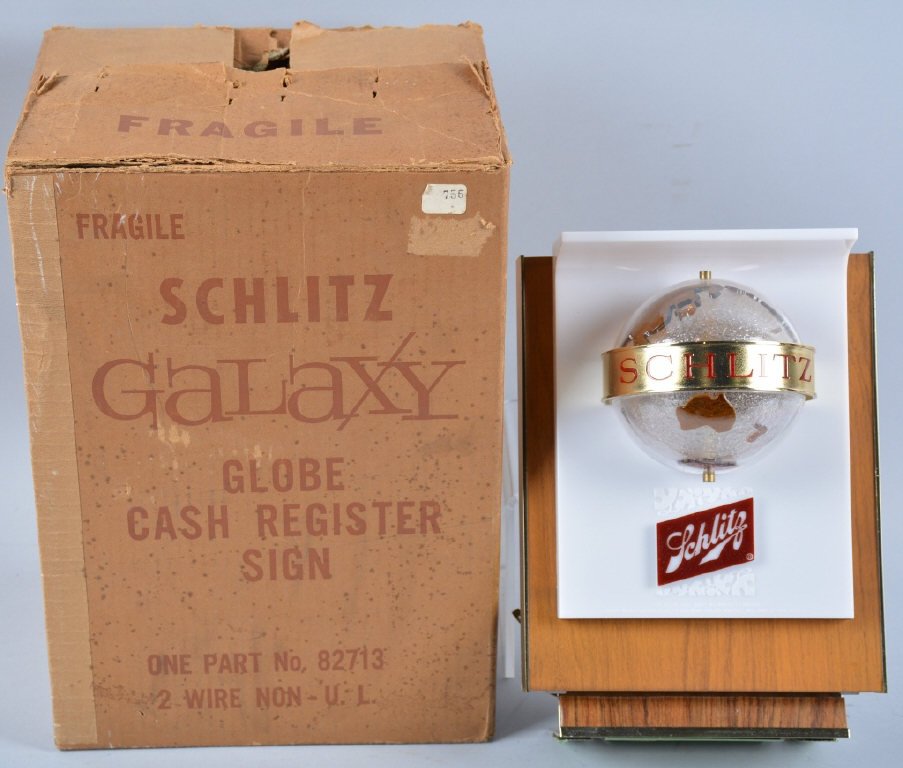 SCHLITZ GALAXY GLOBE Electric CASH REGISTER SIGN: 1960s New Old Stock Schlitz Beer Galaxy Globe electric Cash Register Sign. Sign is never used still in original box. Measures about 10" tall. Great colors and graphics. Near Mint