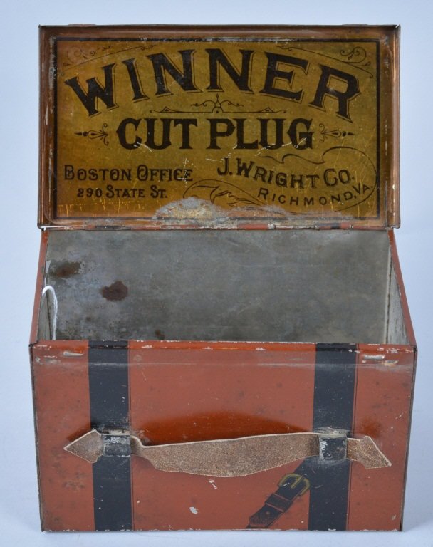 WINNER CUT PLUG STEAMER TRUNK TIN: Excellent tin looks like a Steamer Trunk. Still has leather handle. Great color and desong, Slight edge wear. Excellent