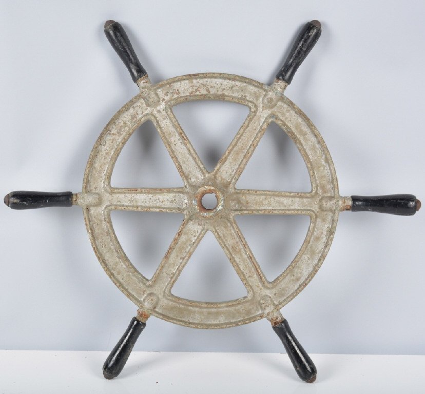 Cast Metal Boat Wheel, Vintage: Nicely cast metal with wooden handles. There is some cracking to handles, and overall wear. 25" diameter, Good