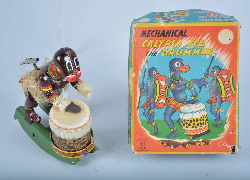 TPS Tin Windup CALYPSO JOE DRUMMER w/BOX: Excellent TPS windup toy. All original with great colors and details. Still has original drum. Windup works well. With colorful original box. Missing one hand. Excellent