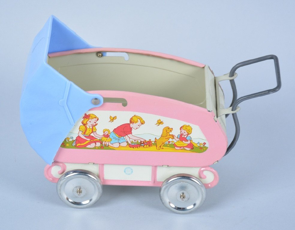 OHIO ART Tin BABY CARRIAGE: Very nice looking tin Baby Carriage by Ohio Art. Looks never played with condition. Great colors and graphics. Near Mint