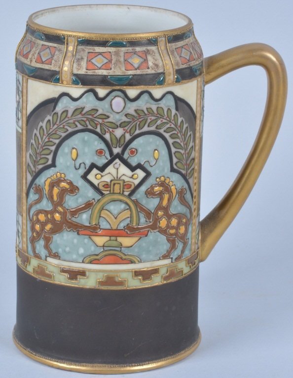 Nippon Hand Painted Stein: Very nice hand painted stylized pattern porcelain stein Circa 1910 with raised enameling. measuring 7 1/8" high. Excellent graphics and colors. Excellent