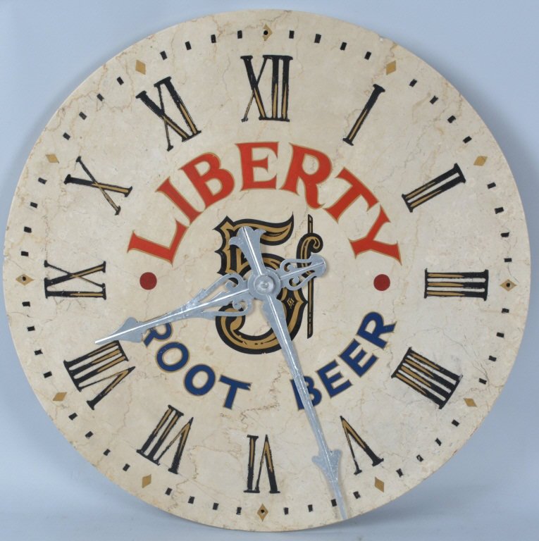 LIBERTY ROOT BEER MARBLE ADVERTISING CLOCK: Nice marble clock face with Liberty Root Beer Advertising. Circa 1920s-30s. Beautiful colors and very detailed hands. Measures 25" across. Excellent