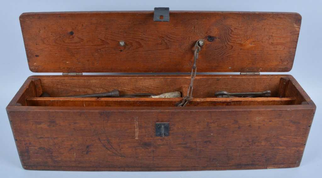 Antique Wood Tool Box and Tools: Nice primitive wood box, missing leather handle. Comes with several vintage tools. Measures 32" by 8", Good