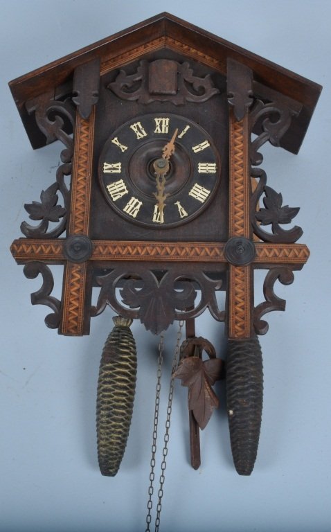 German Inlayed Wood Cuckoo Clock, Vintage: Manufactures by Kuner Bros. Villigen Germany. Measures 14" by 13 1/4". Excellent