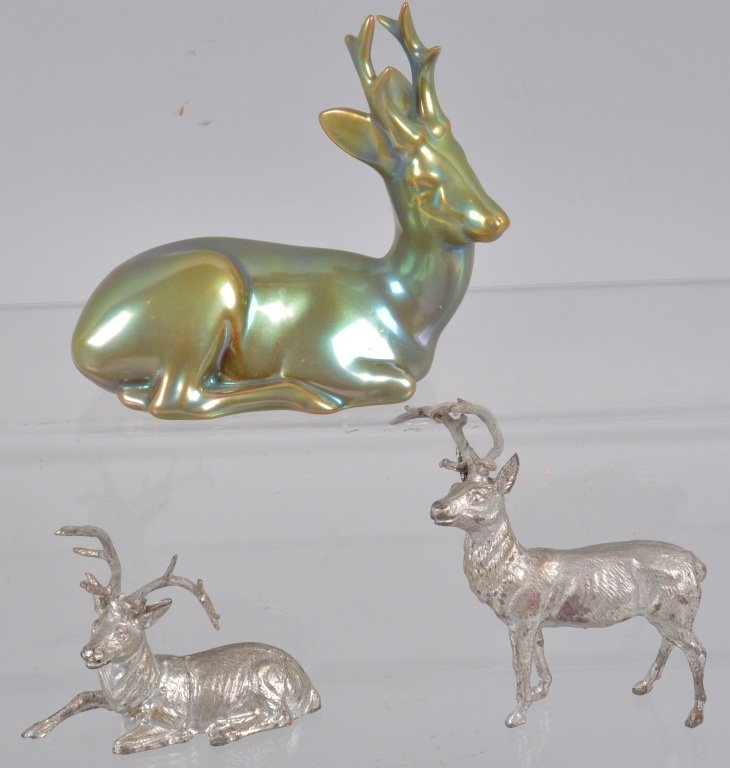 Zsolnay Stag and 2 Vintage Stags: Very nice 5" Zsolnay reclining stag, a German reclining stag, and a cast metal stag. Excellent