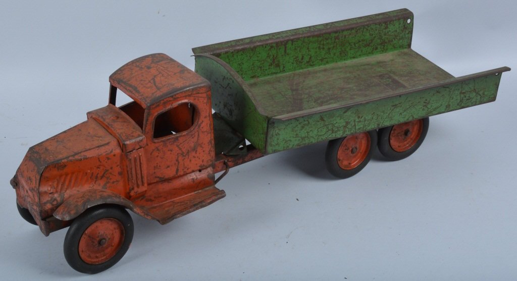 Turner 1920's Toy Mack Dump Truck: Measures 27" long, missing tail gate. Good