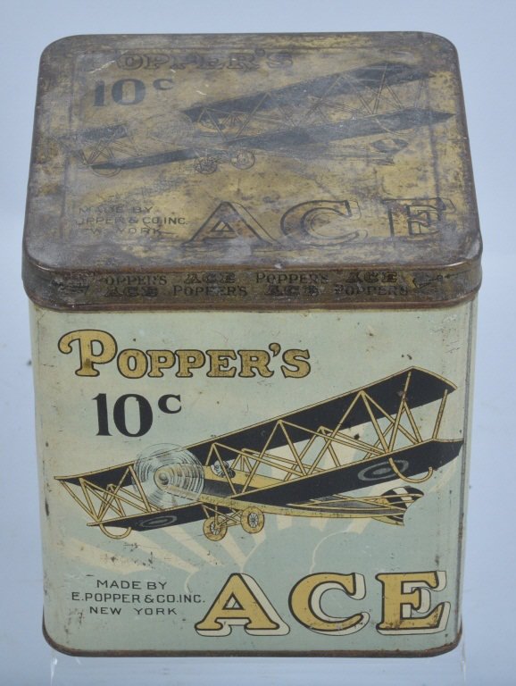 POPPER'S ACE CIGAR TIN: Excellent Popper's Ace Cigar Tin. Great colors and image of early Bi-Wing Airplane. Measures 6" tall. Excellent