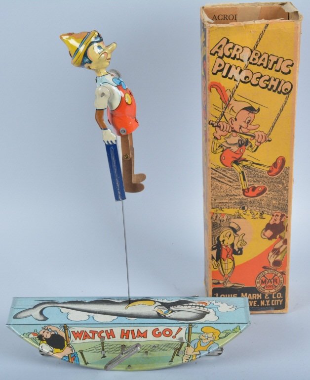 MARX Tin Windup ACROBATIC PINOCCHIO w/Box: Scarce Marx windup Pinocchio toy. All original with great colors and details. Base has great litho of Jimney Cricket, Figaro, and more. Windup works well. Comes with rare original box. Excellent