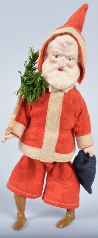 Early GERMAN Windup SANTA CLAUS w/ TREE: Very early German windup compostion Santa Clause hold small feather style tree. Toy is all original with great details and colors. Has original made in germany decal on foot. Windup works well. Measur