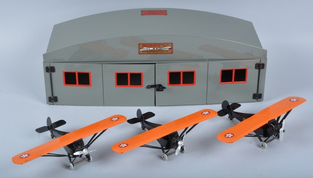 BUDDY L Pressed Steel 3 AIRPLANES & HANGER: Nice restored Buddy L Hanger with 3 Airplanes. Professionally restored. Paint looks excellent. Decals match the factory. All 3 planes restored to look like new. Hanger measures 20" across. Very nice p