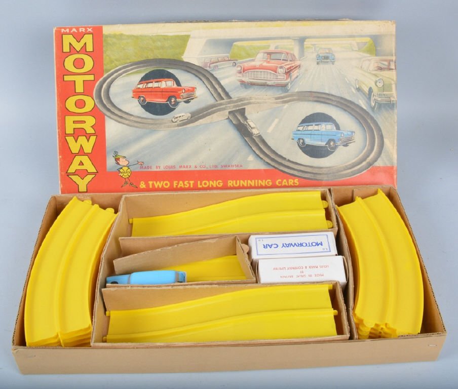 MARX Windup MOTORWAY SET w/Box: Very unique Marx toy made in Great Britain. Set includes 2 windup Station Wagons and Track. Set is complete and looks never played with. Includes boxes for both cars and the set box. Near Mint