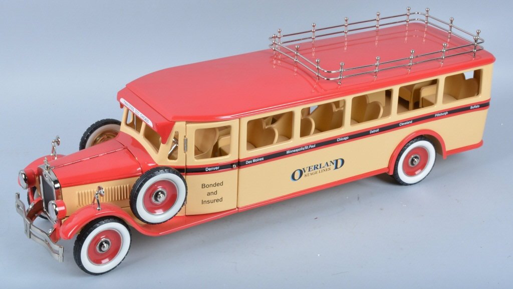 RETRO TOYS Pressed Steel OVERLAND BUS: Excellent looking Overland Bus by Retro Toys of Chicago. All original and unplayed with. Very beautiful pressed steel toy! Great details and many moving parts. Measures 29" long. Near Mint