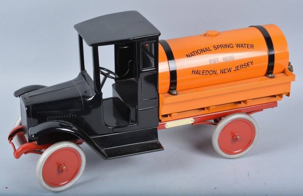 LES PAUL Pressed Steel BUDDY L TANK TRUCK: Excellent Les Paul original National Spring Water Buddy L Tank Truck. Beautifully done truck. Paint and decals looks great. Has Les Paul tag on frame. Measures 26" long. Near Mint