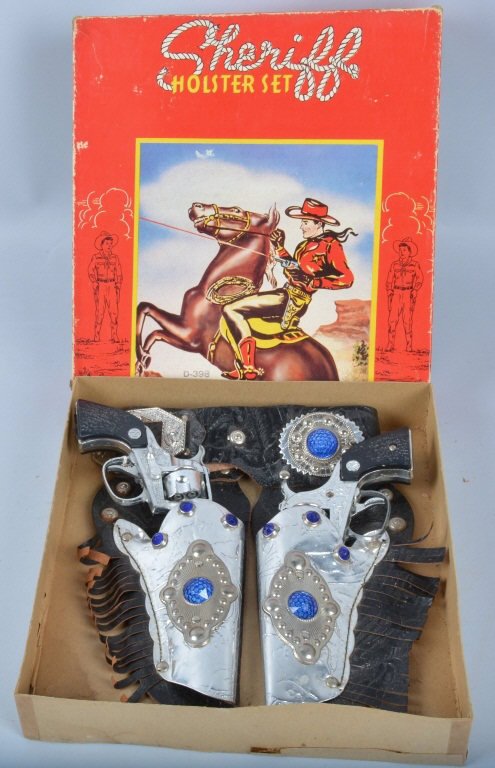 NICHOLS SHERIFF Stallion 22 CAP GUN HOLSTER w/Box: Excellent Nichols Sheriff Holster Set. Includes 2 beautiful Stallion 22 Cap Guns. Both guns are all original with great finish and working. Comes with very fancy leather holster set. With colorful ori