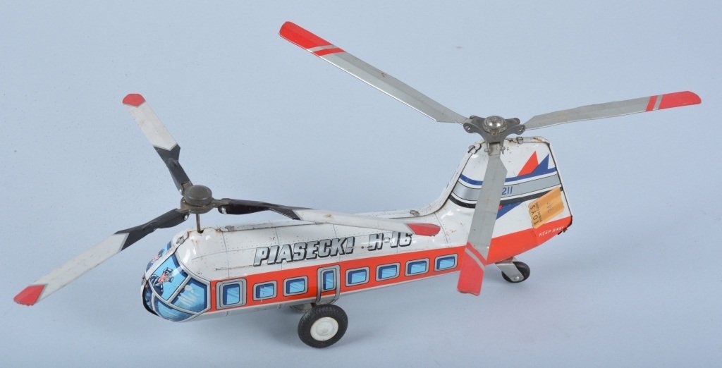 JAPAN Tin Friction PIASECKI H-16 HELICOPTER: Nice double prop helicopter. Nice colors and details. Friction works. 10" long. Has original price sticker. Excellent