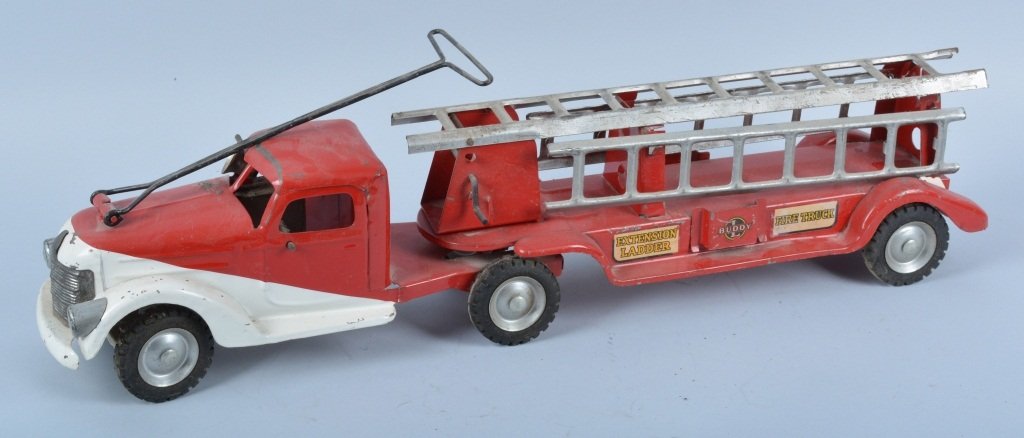 BUDDY L Pressed Steel EXTENSION LADDER TRUCK: Nice early Buddy L with slanted paint front end. All original with 3 ladders and pull. Paint is beautiful with nice decals. 30" long. Excellent