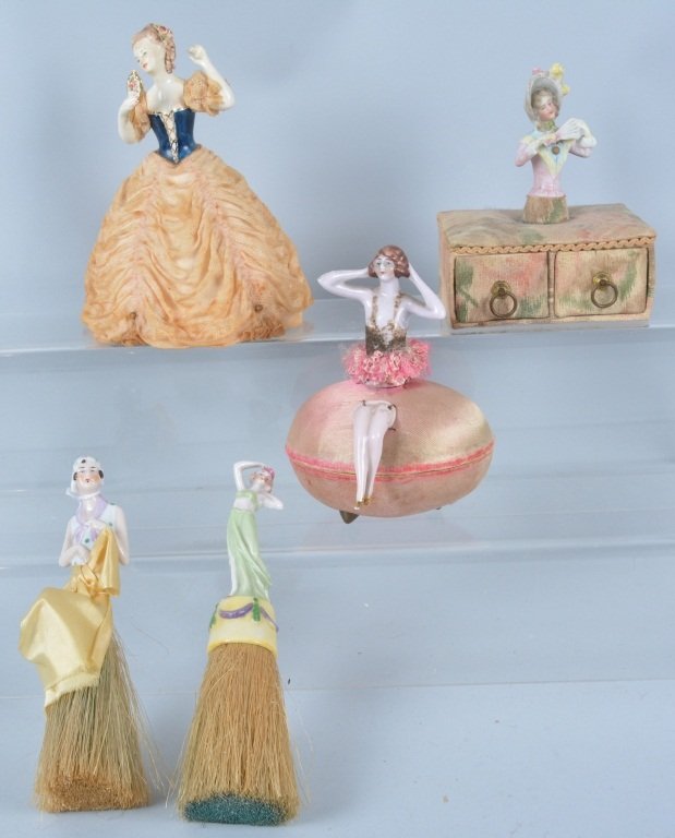 Lot of 5 Bisque Doll Vanity Items: Great lot with 2 bisque brushes, a California Dresden doll, and a 2 containers with bisque half dolls. Largest is 7" tall, some soiling. Displays great. Excellent