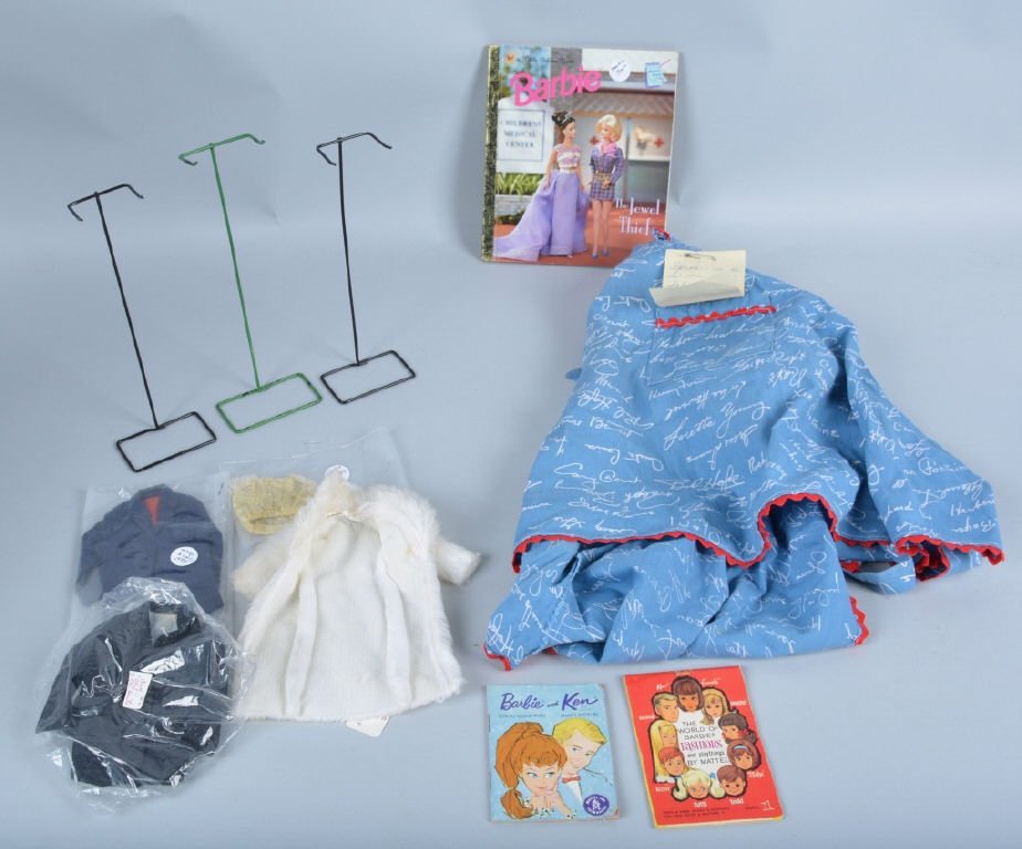 Lot of Mattel Barbie Items, & Movie Star Apron: Interesting lot with original Barbie and Ken clothing, doll stands. booklets and Little Golden Book. Also included is a circa 1940 apron with movie star signatures, and a pair of Ginny pants. Excellen