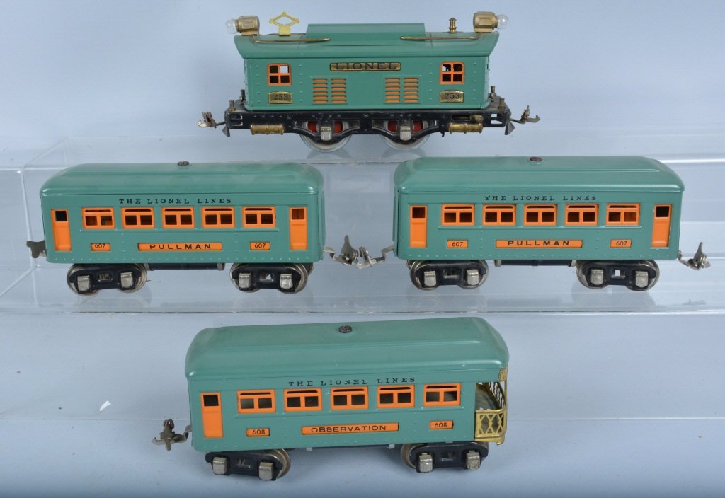 LIONEL O GAUGE 253 ENGINE & 2-607 & 608 CARS: Beautiful O Gauge Train Set by Lionel. Includes #253 Engine, 2- 607 Pullman Cars, and 608 Observation Car. All in Peacock. The set is an original set that has been professionally restored. Near Mint
