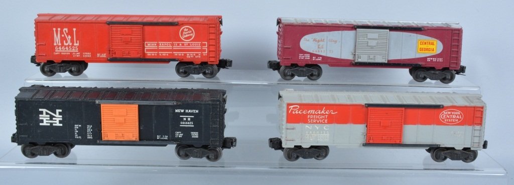 Lot of 4 LIONEL BOX CARS: Lot includes 4 post war Lionel Box Cars. All original. Excellent