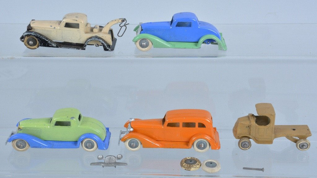 Lot of 4 TOOTSIE TOY GRAHAMS & MORE: Lot includes 4 Tootsie Toy Grahams and 1 Bulldog Mack. All have been repainted. Missing some parts and headlights. Very Good