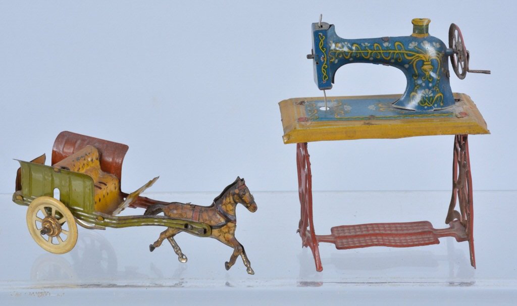 PENNY TOY SEWING MACHINE & WAGON: Nice lot of early German Penny Toys. Includes Sewing Machine and Horse Drawn Wagon. Wagon missing passenger. Nice colors and details. Excellent