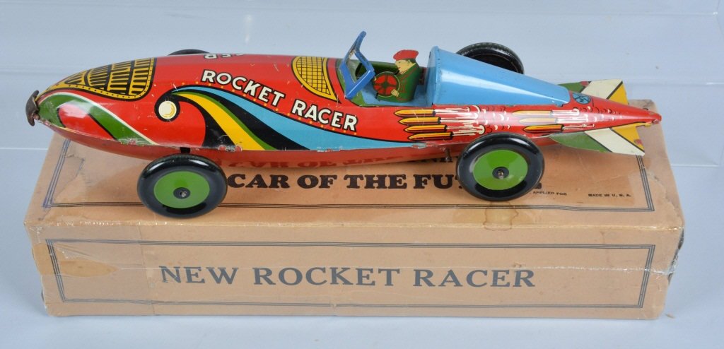MARX Tin Windup NEW ROCKER RACER w/ BOX: Excellent early Marx Rocket Race Car. All original including driver. Has great colors. Windup works well. Comes with scrace original box. 16" long. Excellent