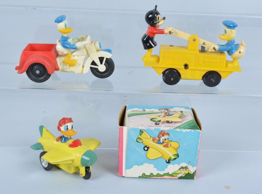 Lot of 3 MARX DONALD DUCK TOYS: Includes windup Donald & Mickey Hand car, Donald Friction Motorcycle, and Donald Friction Airplane in Box. All original. Excellent