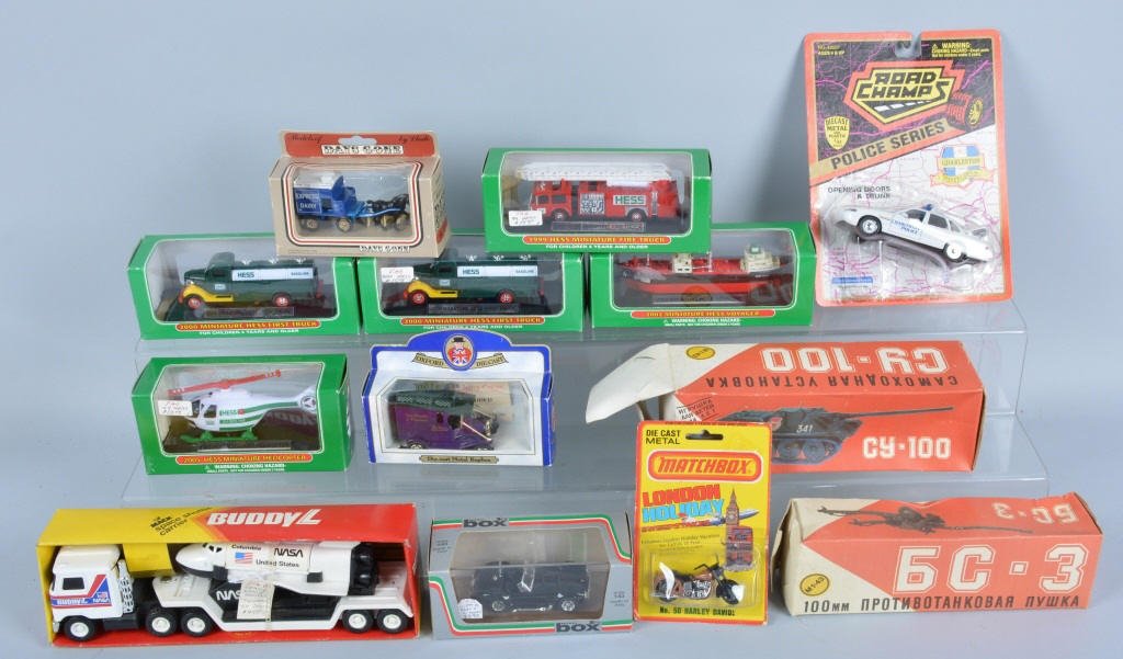 Lot of 13 DIECAST VEHICLES w/ BOXES: Includes Hess Miniatures, Buddy L NASA, Matchbox Cycle, Lledo Wagon, Model Box, Cobra, Russian Tanks, and More. All boxed. Excellent-Near Mint