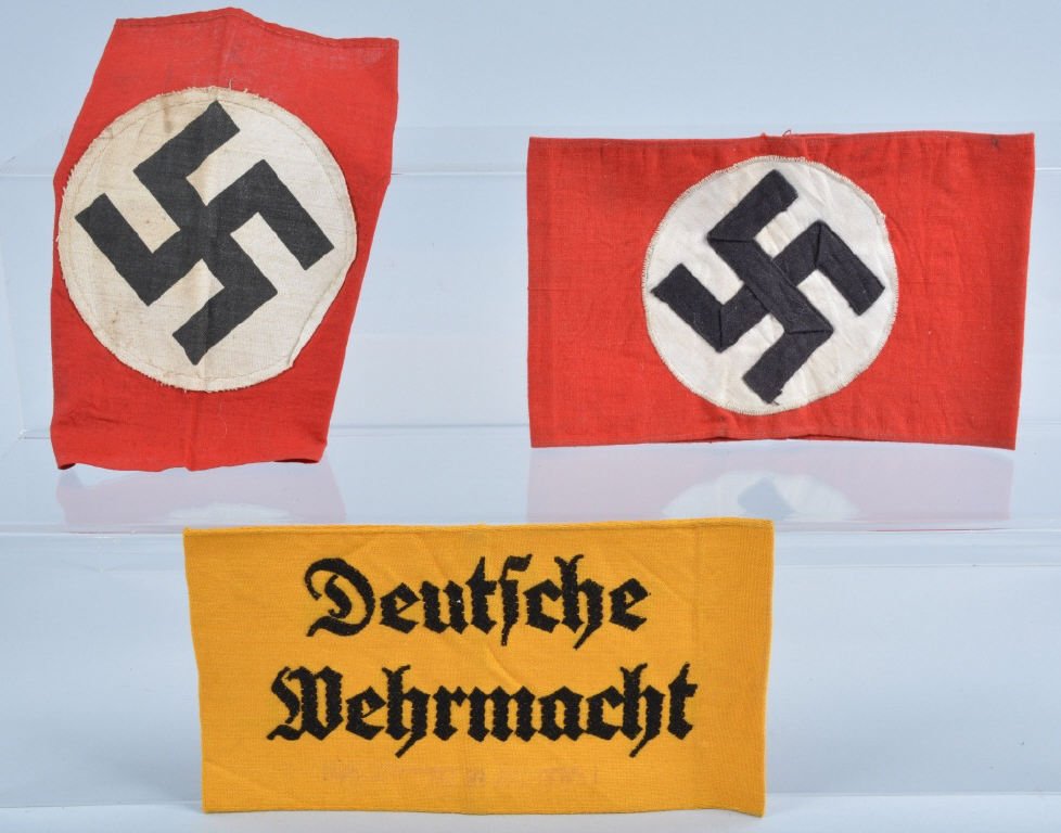 WW2 Nazi Germany Arm Bands and Small Flag: Lot includes 2 arm bands, along with an 11" by 7" double sided flag. Light soiling . Very Good-Excellent