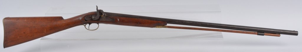 Antique Percussion Half Stock Shot Gun: Measures 45 1/2" with a 30 1/2" barrel. Walnut half stock has some dings and hairlines. Missing one ram rod thimble. Action works but does not stay cocked. Very Good