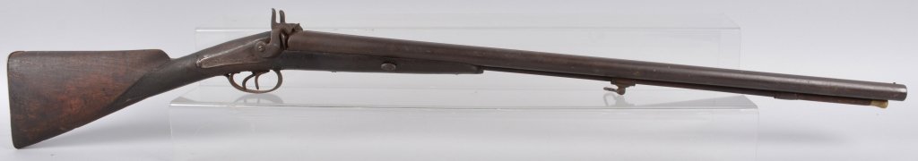 Antique Percussion Double Barrel Shotgun: Measures 46" long and has Belgian proofs on barrel. Action works, missing nipples. General wear and old repair at wrist. Good