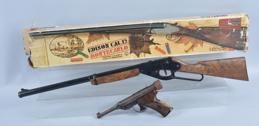 Lot of 3 Toy Guns, Daisy BB & More: Lot includes working Daisy Model 103 rifle, a Hi-Score Air Pellet Pistol, and a Edison Monte Carlo Toy 12 gauge Shot Gun in the original box. Hi-Score pistol is good, with repair to grip. Largest is 3