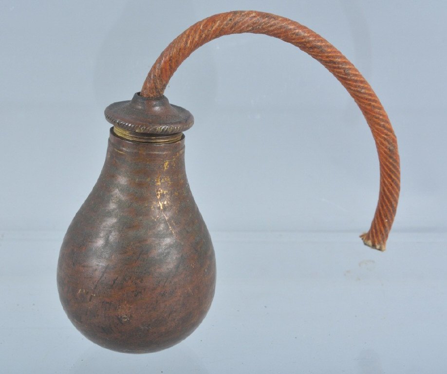 19th Century Copper Grenade, Inert: Interesting piece measuring 2 1/2" high. Made of copper with brass threaded cap and water proof fuse. Inert. Excellent