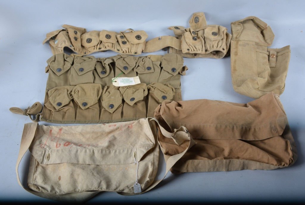 Lot of 4 WW1 & WW2 Items: Nice lot with 1918 dated Grenade vest, WW1 10 pocket Springfield ammo belt, WW1 carry bag and 1942 spare magazine bag. Very Good
