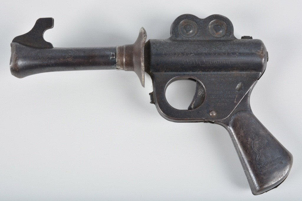 DAISY BUCK ROGERS 25TH CENTURY PISTOL: Nice original Daisy Buck Rogers Pop Gun. Still works. Has some wear to finish. An early Buck Rogers item. Very Good