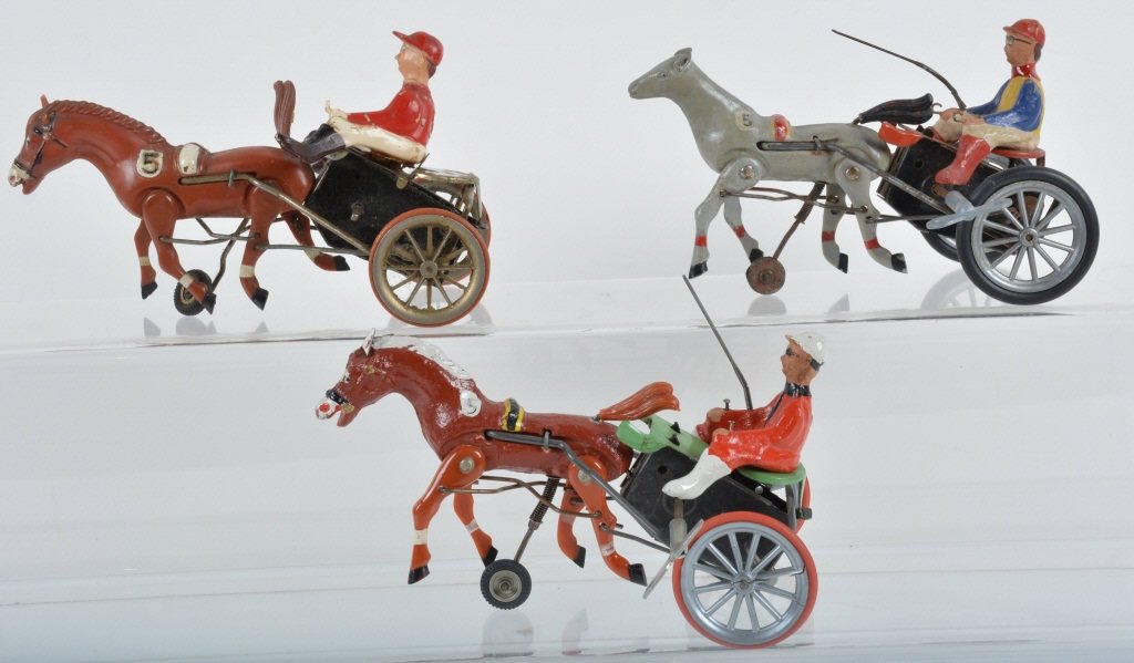 Lot of 3 ARABIAN JOCKEY & SULKY TOYS: Nice lot of 3 original toys. Made in Germany. All original and working. Excellent