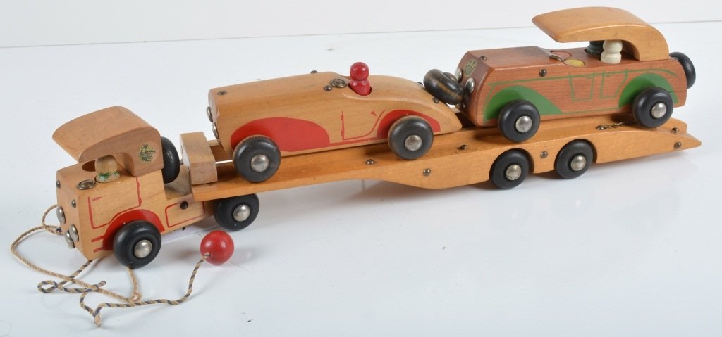 1946 HOLGATE #638 AUTO CONVOY TRAILER w/ CARS: Very nice all original wooden Holgate toy from 1946. All original and appears complete with truck and 2 cars. 20" long. Excellent