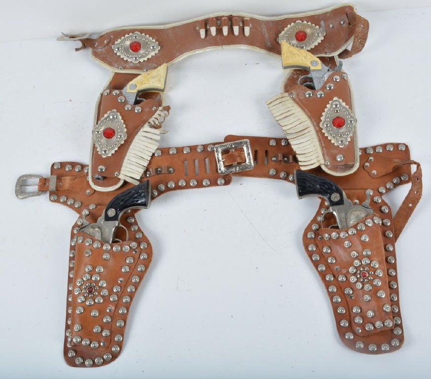 Lot of 2 Vintage CAP GUN HOLSTER SETS: Includes 2 Flip Cap Guns in Leather Studded Holster and 2 Kilgore Ranger Cap Guns in Leather Holster. All original with some wear. Very Good