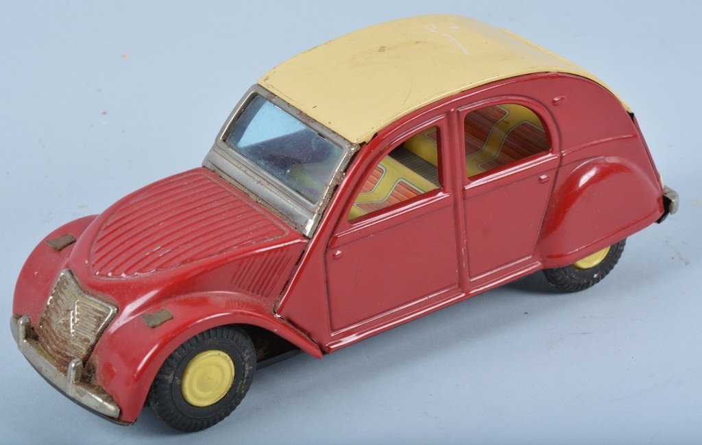 JAPAN Tin Friction CITROEN 2GV: Unusual Japanese tin friction Car. Great colors and details. Headlights are broke. Friction drive works. 8" Very Good
