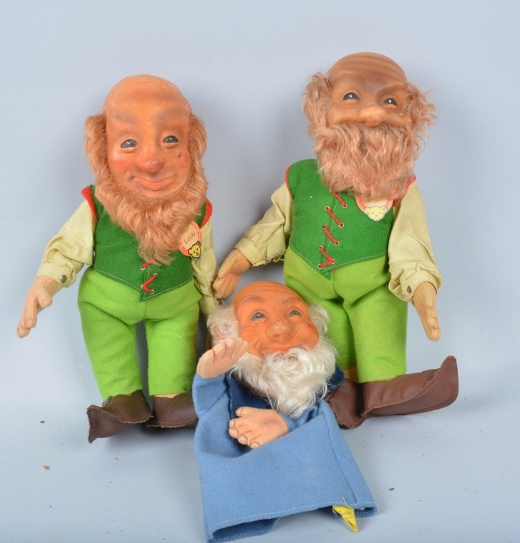 Lot of 3 Steiff Lucki Dolls: Largest measures almost 11". Lot includes 2 dolls and a Puppet. Some over all wear especially to face. Good-Very Good